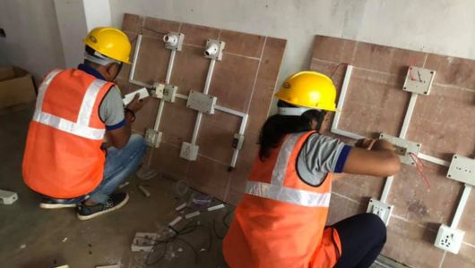 Participants in Building Electrician Training
